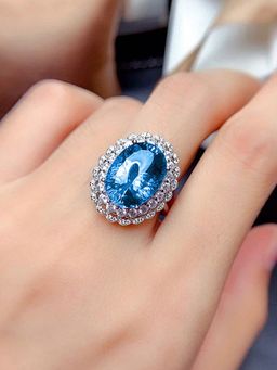 Jewels Galaxy - Silver Plated American Diamond Crushed Ice Cut Blue Oval Finger Ring