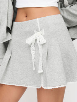 Cider - Cotton-blend Mid Rise Contrasting Lace Bowknot Pleated Mini Skirt