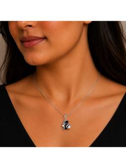 MINOUS - 925 Silver Iconic Reel Pendant
