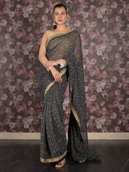 Odette - Women Black Georgette Printed Saree with Unstitched Blouse