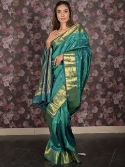 Odette - Women Green Silk Blend Woven Saree with Unstitched Blouse