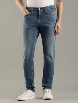 Tommy Hilfiger - Mid-Wash Relaxed Fit Mid Rise Jeans