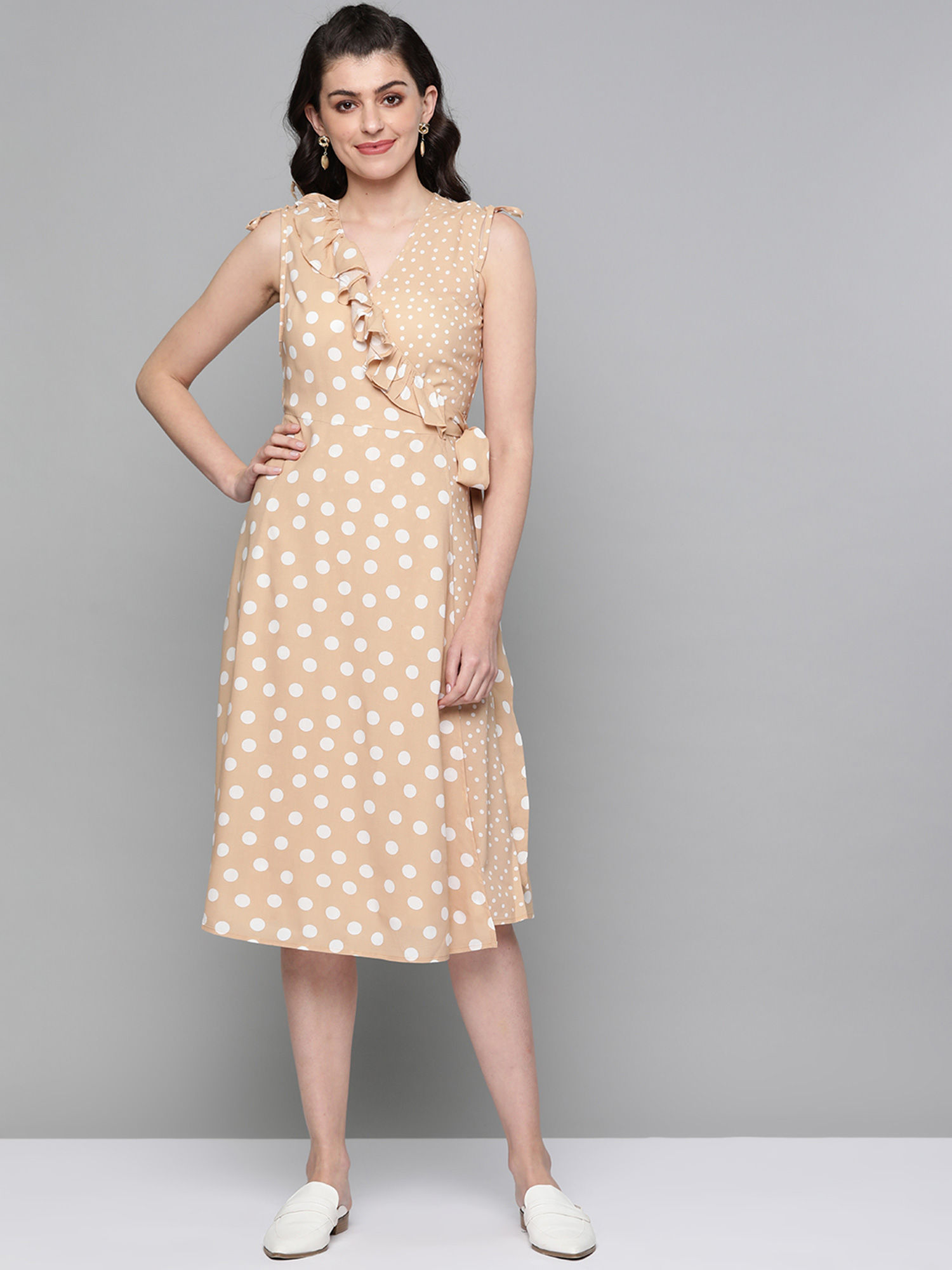 tan and white polka dot ruffle halter neck dress