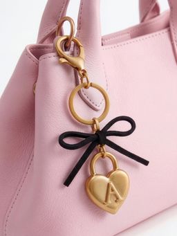 Accessorize London - Women's Gold Heart Lock and Bow Keyring