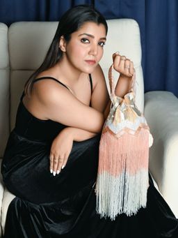 Odette - Peach Encompassing Sequins Beads and Cutdana Potli Bag