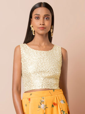 white sequin blouse