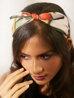 Pipa Bella by Nykaa Fashion - Knotted Orange and Multi-Coloured Print With Green Border Hairband