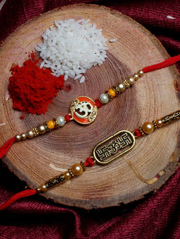 Shoshaa - Gold-Red Om & Sathiya Ethnic Thread Rakhi Set of 2 With Roli Chawal