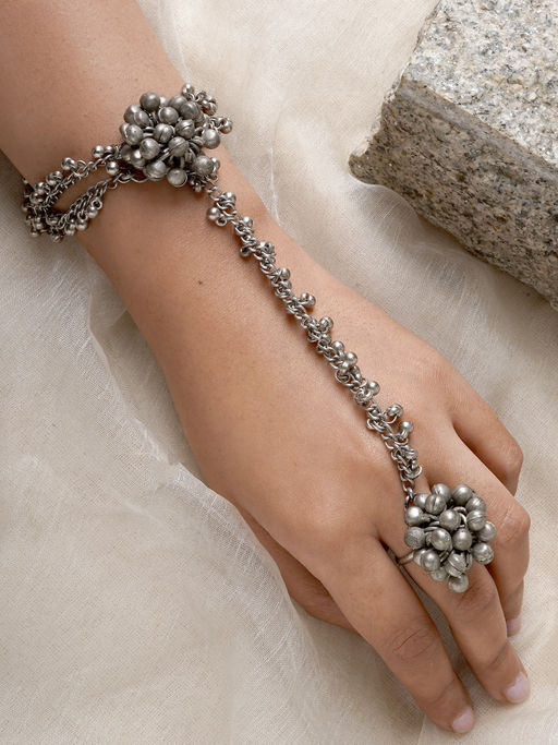 Teejh by Joker and Witch Bhavini Silver Oxidised Ghungroo Haath Phool for Women