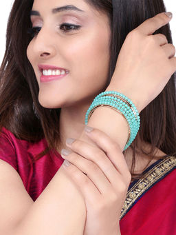 Yellow Chimes - Set Of 4 Pcs Gold Toned Handcrafted Pastel Green Beads Bangles