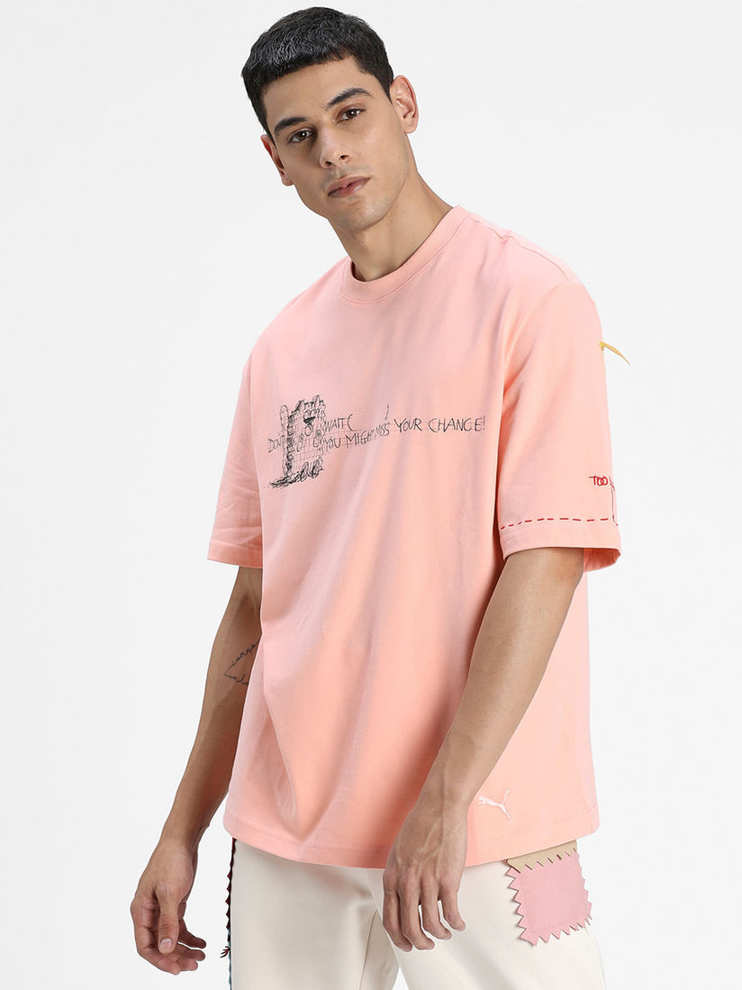 peach puma shirt