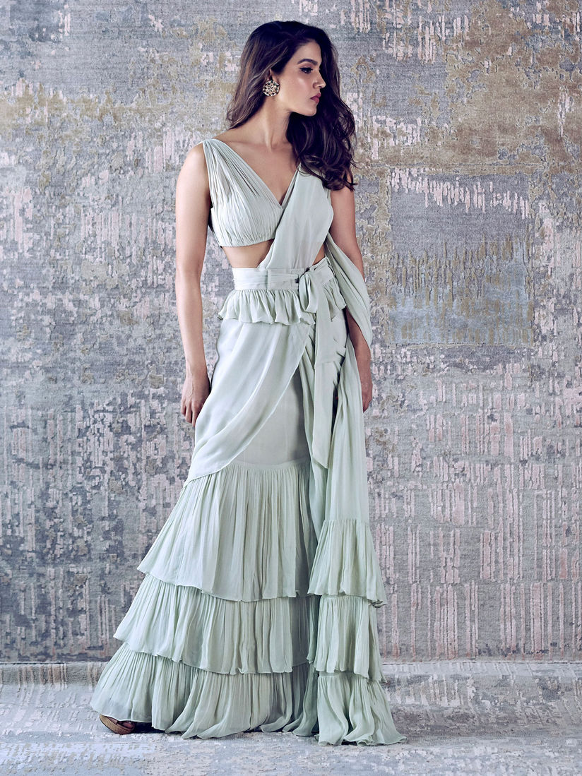 Arpita Mehta Sarees Buy Arpita Mehta Ivory Ruffle Sari With Ruffle Corset Stitched Blouse Online Nykaa Fashion Check out our ruffle saree selection for the very best in unique or custom, handmade pieces from our women's clothing shops. arpita mehta ivory ruffle sari with ruffle corset stitched blouse