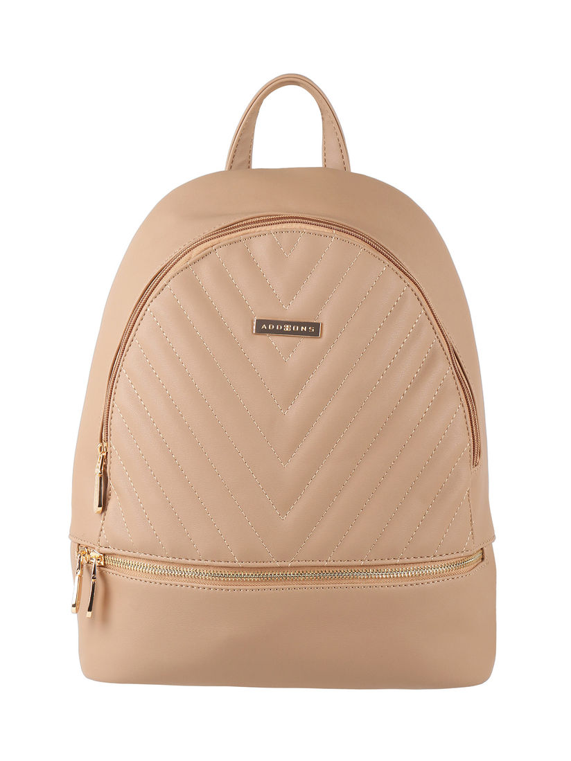 pink quilted backpack