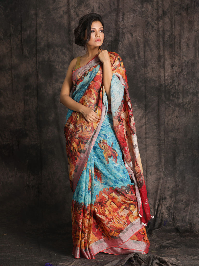 CHARUKRITI Sky Blue Printed Linen Saree With Border With Unstitched Blouse CHARUKRITI Sky Blue Printed Linen Saree With Border With Unstitched Blouse