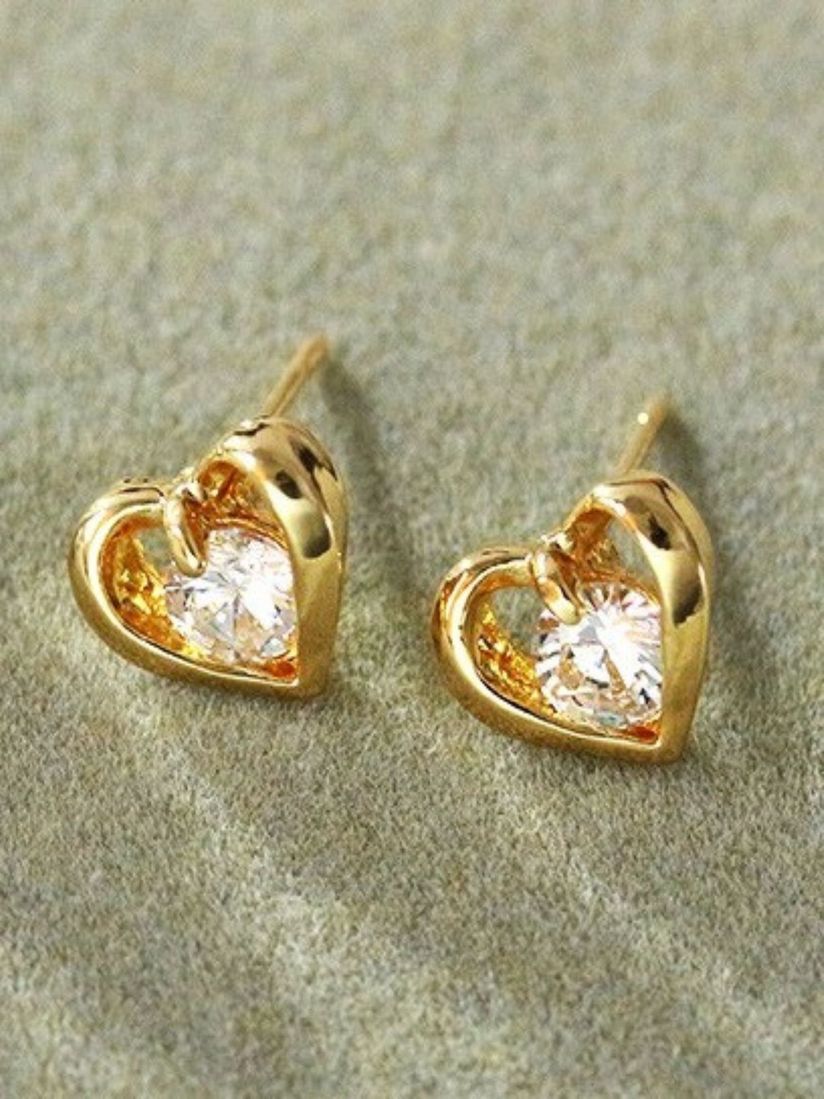 Oomph Earrings Buy Oomph Gold Tone Heart Shape Cubic Zirconia Small Stud Earrings Online Nykaa Fashion