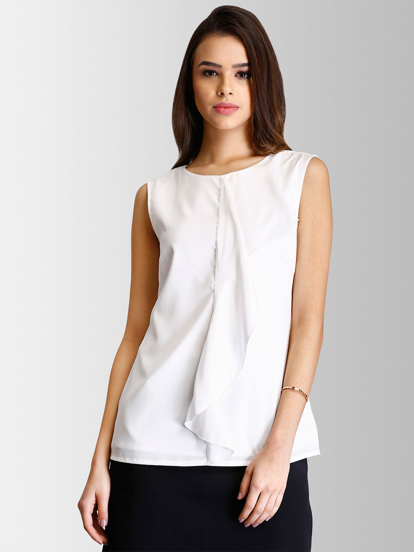 white sleeveless ruffle top