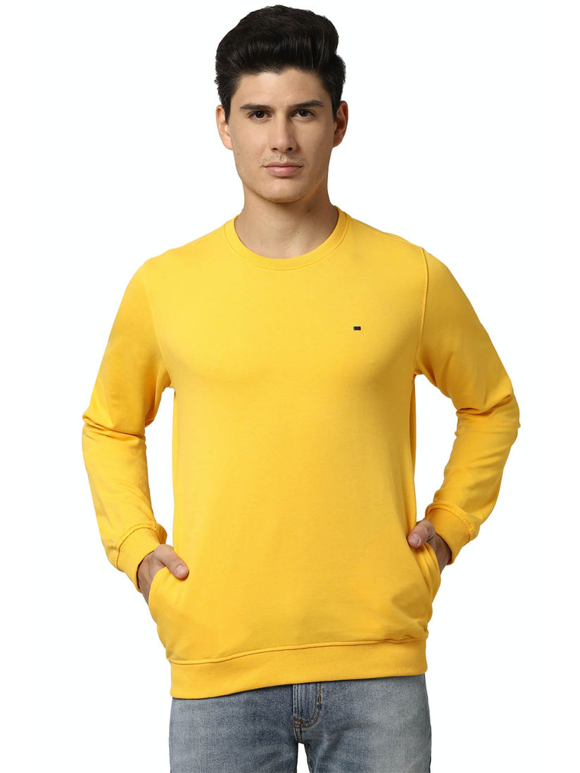 solid yellow sweatshirt