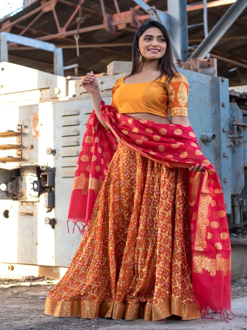 orange and maroon lehenga