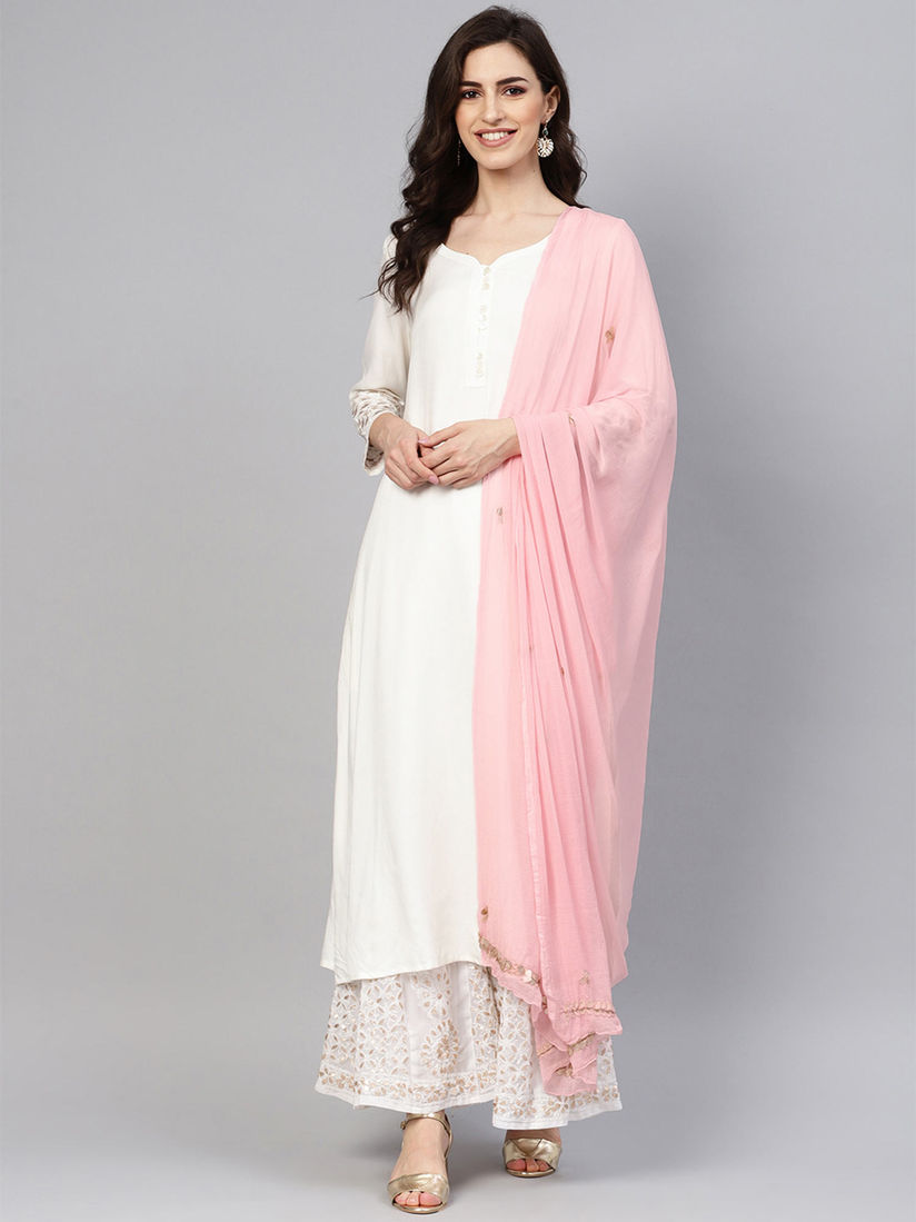 off white suit with pink dupatta