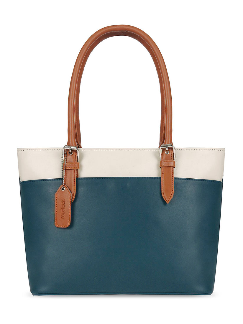 Toteteca Handbags Buy Toteteca Teal Colorblock Handbag Online Nykaa Fashion According to one review, cranberry juice contains compounds that may prevent e. toteteca teal colorblock handbag