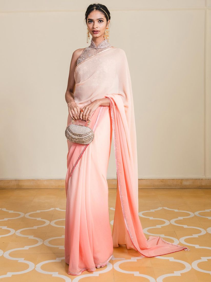 Tarun Tahiliani Sarees Buy Tarun Tahiliani Peach Chiffon Saree With Stitched Blouse Set Of 2 Online Nykaa Fashion Necklace sets and earrings are available in various colours, artwork, styles and more to compliment your ethnic look.