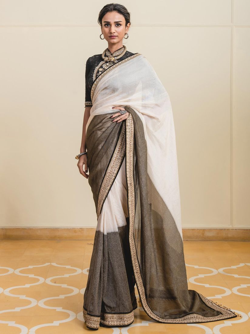 Tarun Tahiliani Sarees Buy Tarun Tahiliani Beige Saree With Stitched Blouse Set Of 2 Online Nykaa Fashion Tarun tahiliani has an exclusive collection of minimalist yet traditional maangtikkas and earrings.