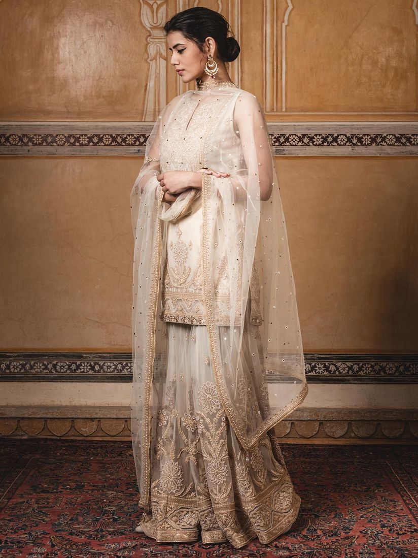 Tarun Tahiliani Salwar Suits And Sets Buy Tarun Tahiliani Beige Kurti With Sharara And Dupatta Set Of 3 Online Nykaa Fashion Buy the latest luxury collection of womenswear, menswear, accessories, and more for various occasions by designer tarun tahiliani.