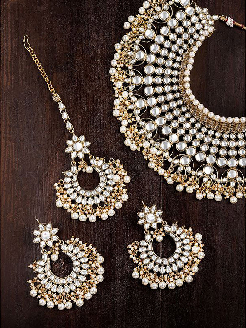 Zaveri Pearls Jewellery Sets Buy Zaveri Pearls Gold Tone Beautifully Embellished With Kundan Pearls Bridal Choker Necklace Set Online Nykaa Fashion